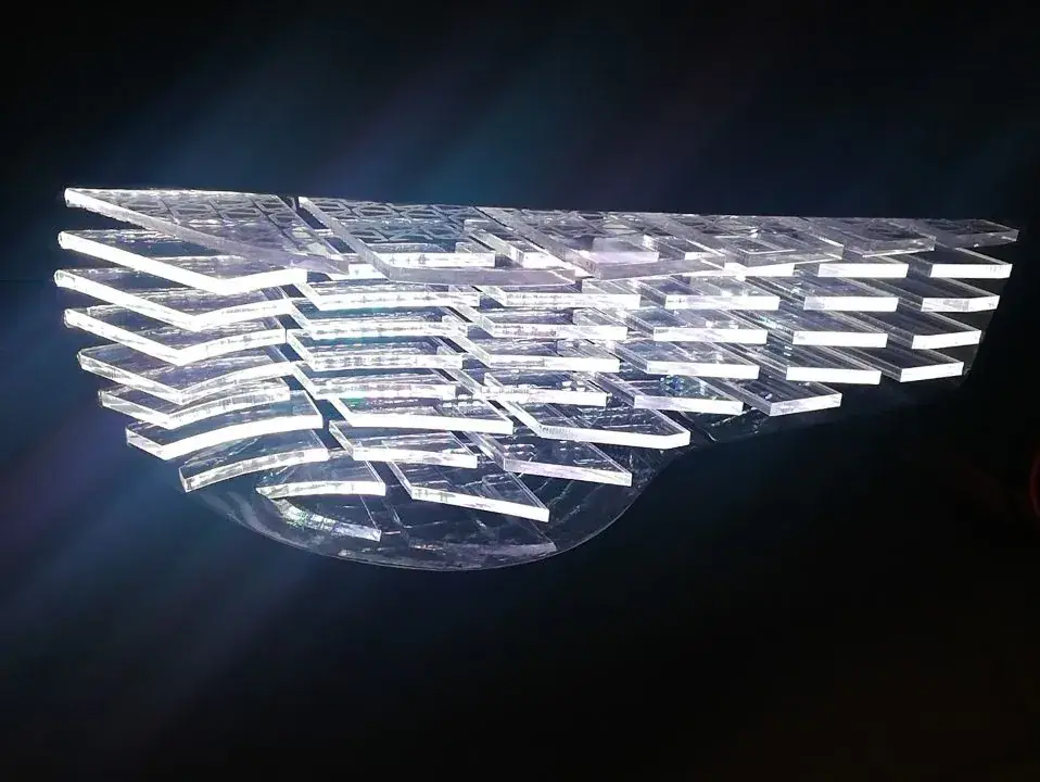 Acrylic slats lit up white during the build