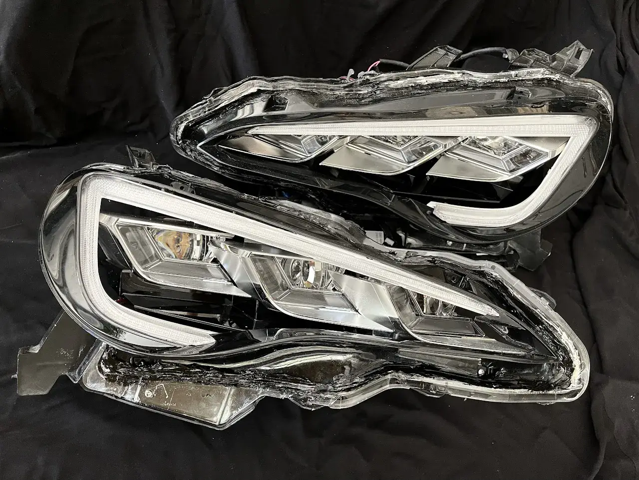 Pair of headlights on a dark background