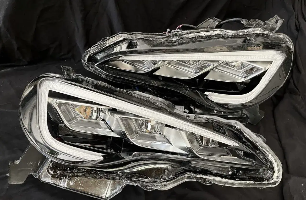 Pair of finished triple-lens headlights