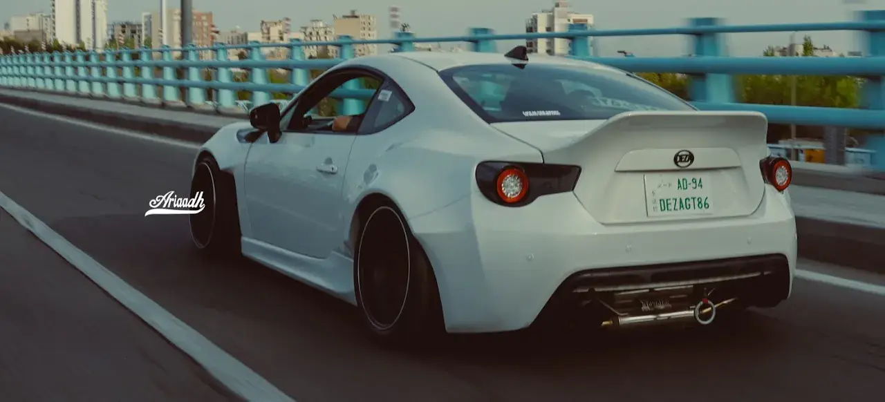 NYX driving on a motorway, rear view