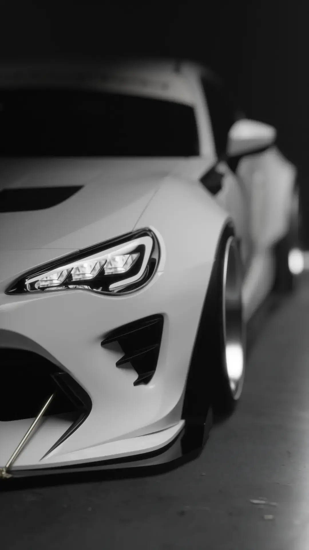 Vertical render of the triple-lens headlight on NYX
